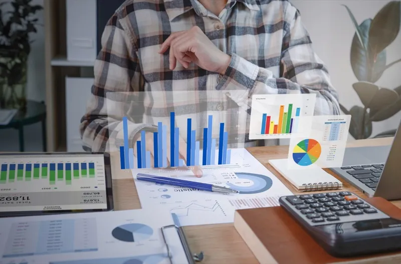Technicians using enterprise asset performance management tools for predictive maintenance.
