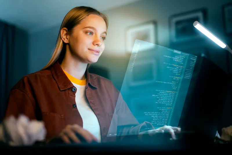 IT professional using hardware asset management audit checklist to track company devices.