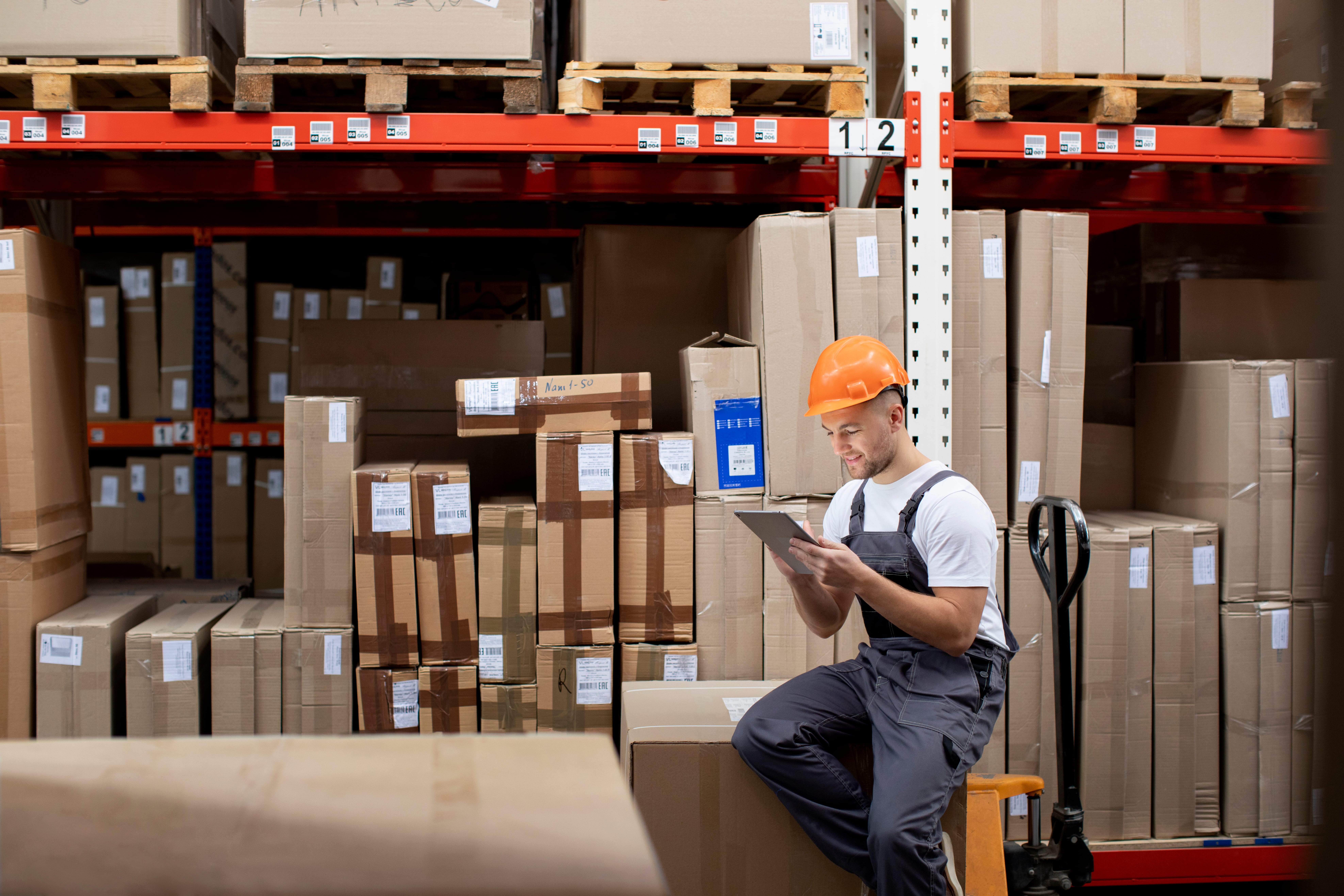 medium-shot-man-sitting-warehouse Perpetual Inventory System Explained